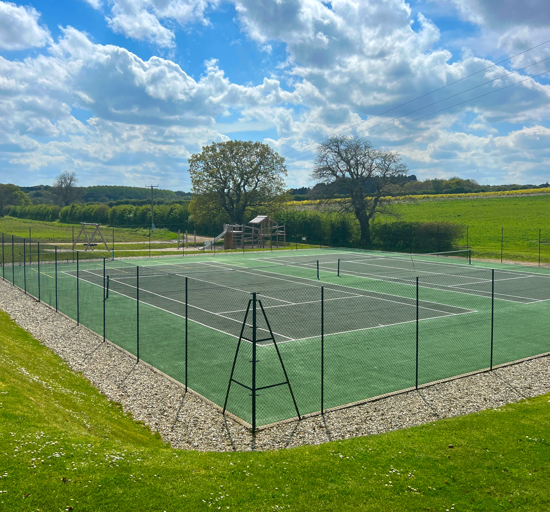 Tennis courts and children's play area
